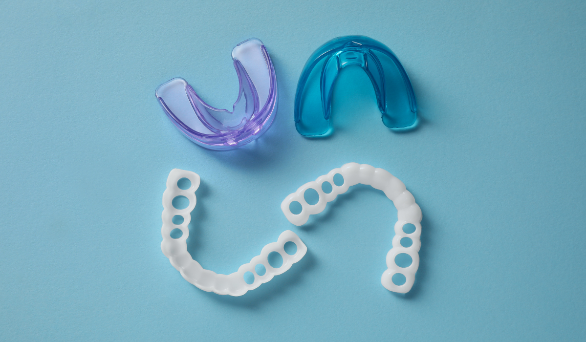 Emergency dentist at Trafalgar Village Dental treating athlete with sports-related dental injury