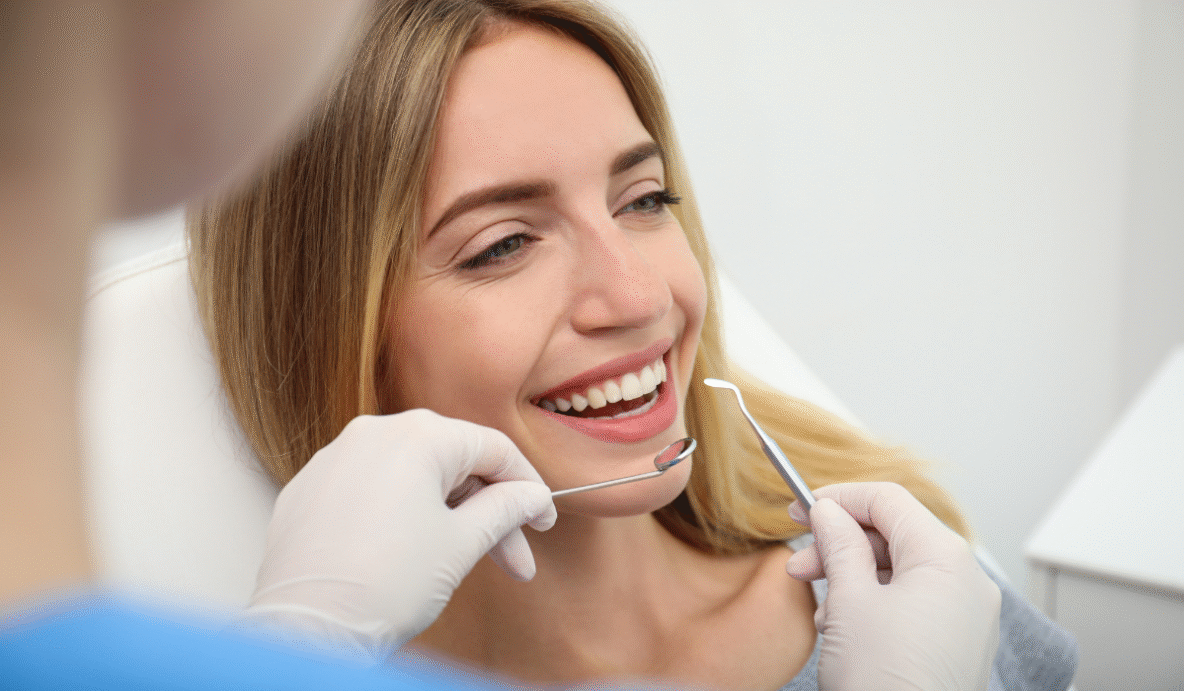 Dentist in Oakville providing cosmetic dentistry treatments at Trafalgar Village Dental