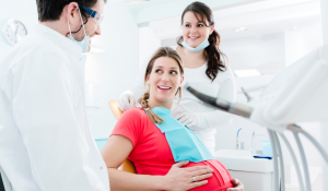 Family dentist at Trafalgar Village Dental providing safe pregnancy oral health care in Oakville